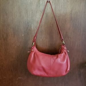 Red leather shoulder bag.